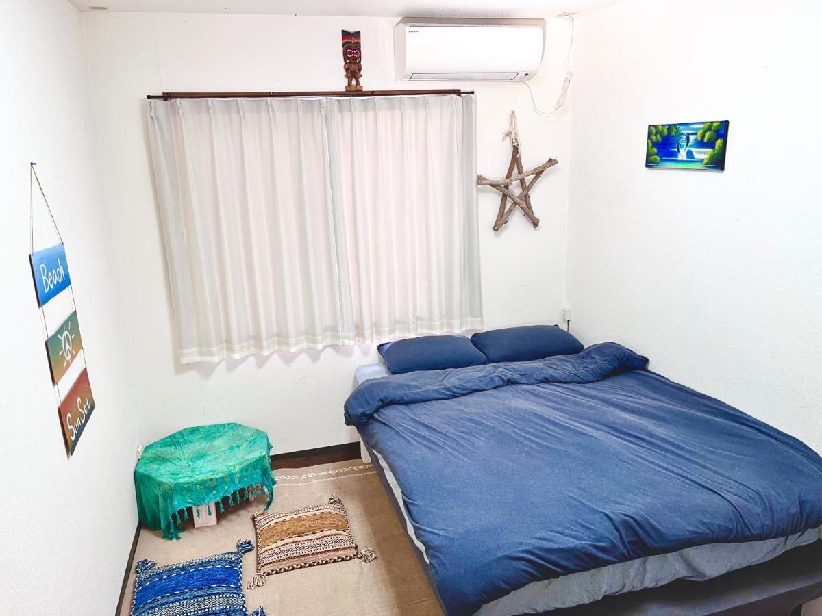 Guest House Waraemon Nago Exterior foto