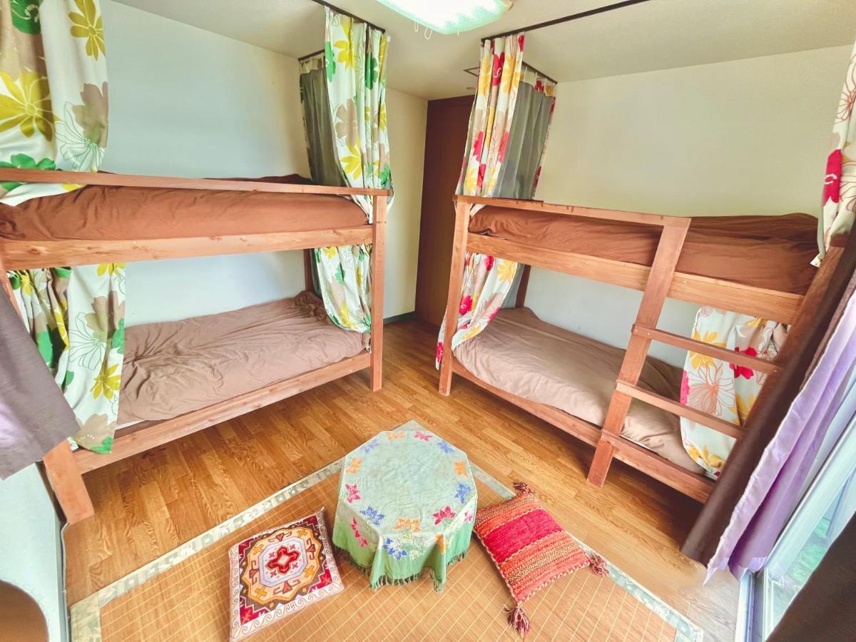 Guest House Waraemon Nago Exterior foto